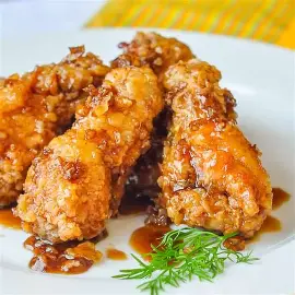 Chicken wings coated Buffalo Honey Garlic Sauce